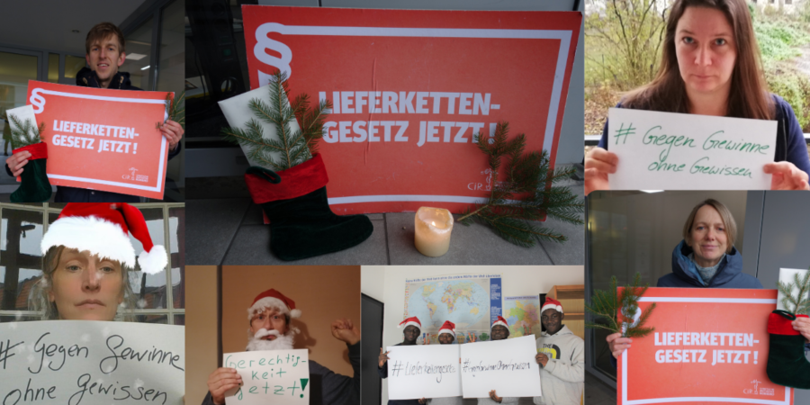 Lieferkettengesetz jetzt! Mehrere Personen halten Plakate in die Kamera.