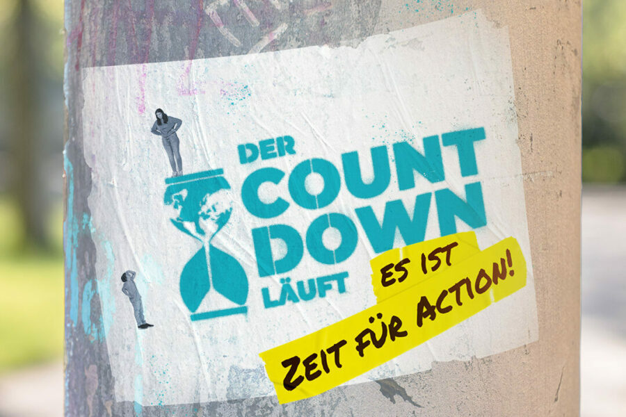 2022-01-26_Schulwettbewerb2 Bild auf einer Säule mit dem Spruch: Es ist ZEit für Action