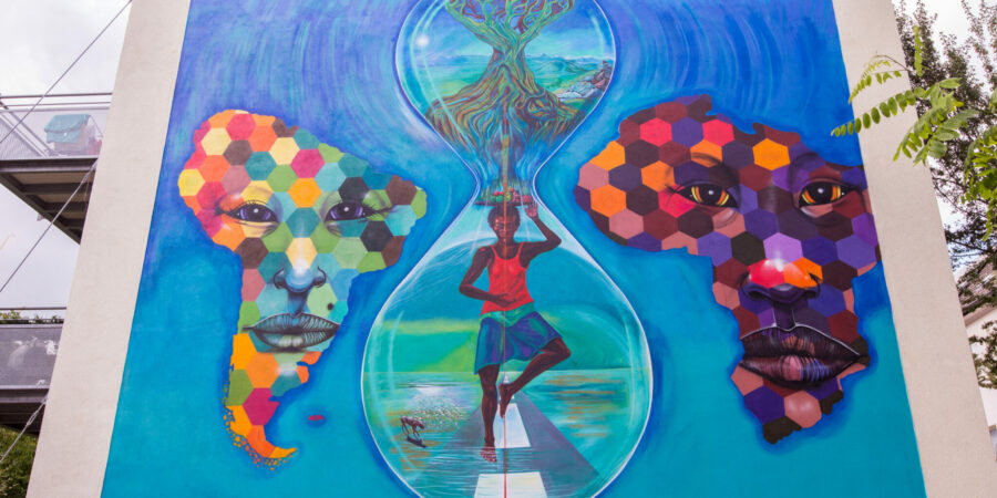 Auf dem Bild von Jorge Hidalgo sieht man das Wandbild auf der Travelmannstraße.