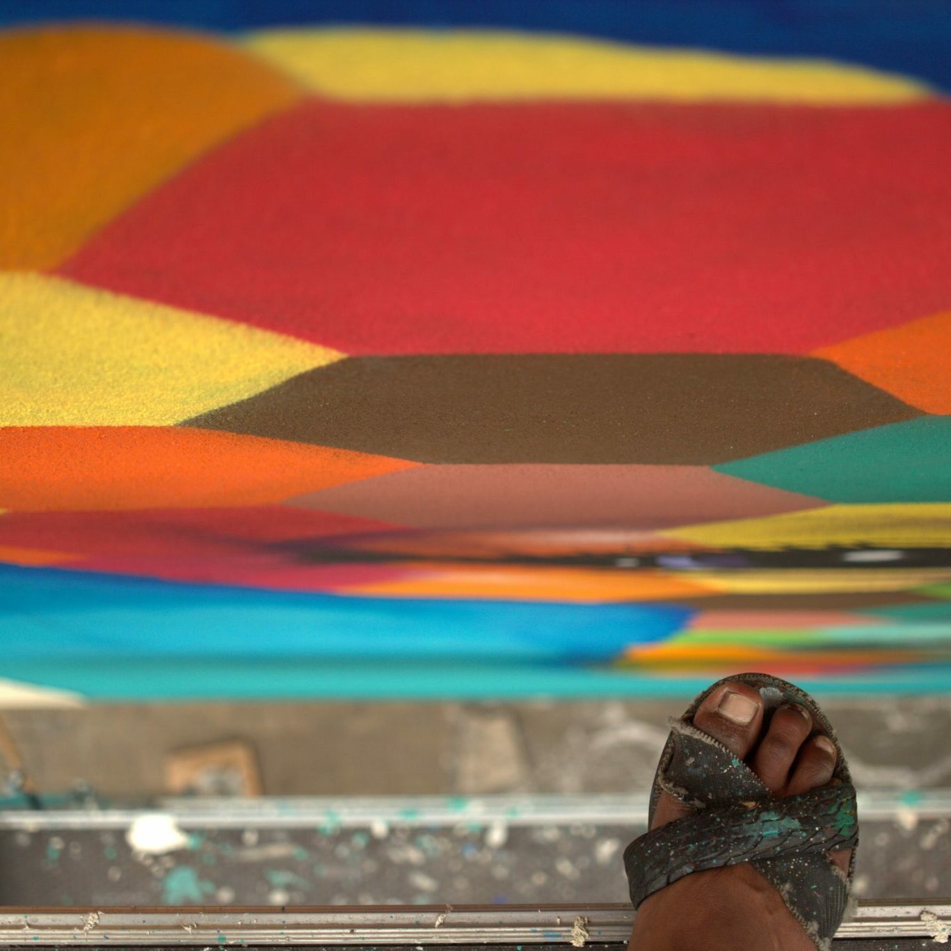 Auf dem Bild von Jorge Hidalgo sieht man das Wandbild auf der Travelmannstraße.