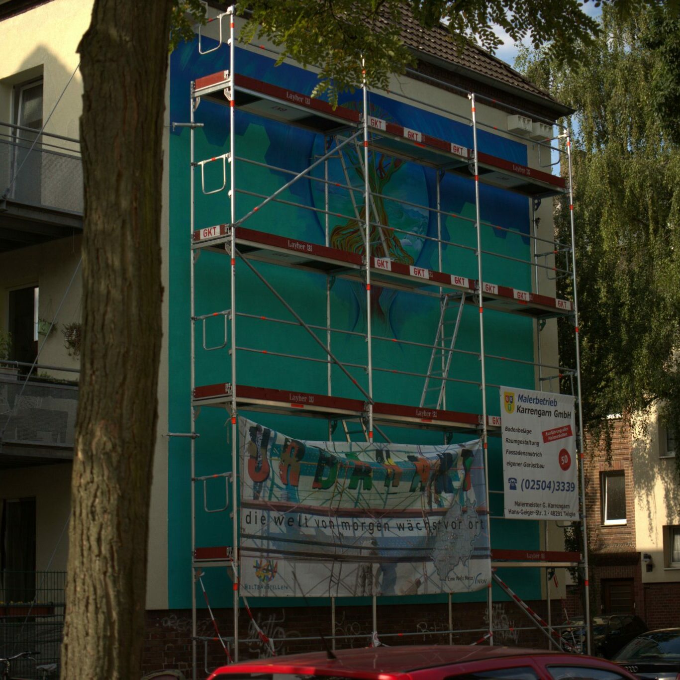 Auf dem Bild von Jorge Hidalgo sieht man das Wandbild auf der Travelmannstraße.