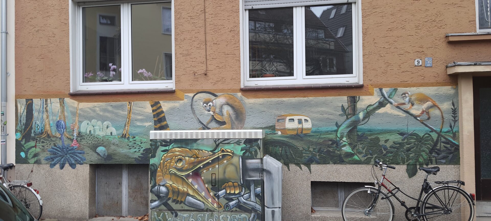 Auf dem Bild sieht man einen Ausschnitt des Wandbilds auf der Staufenstraße.